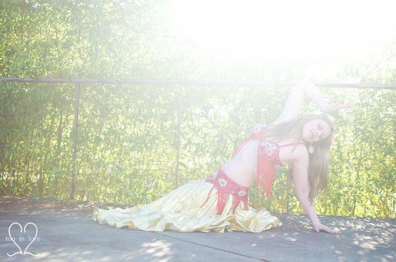 Female model photo shoot of Kat Ross Belly Dance