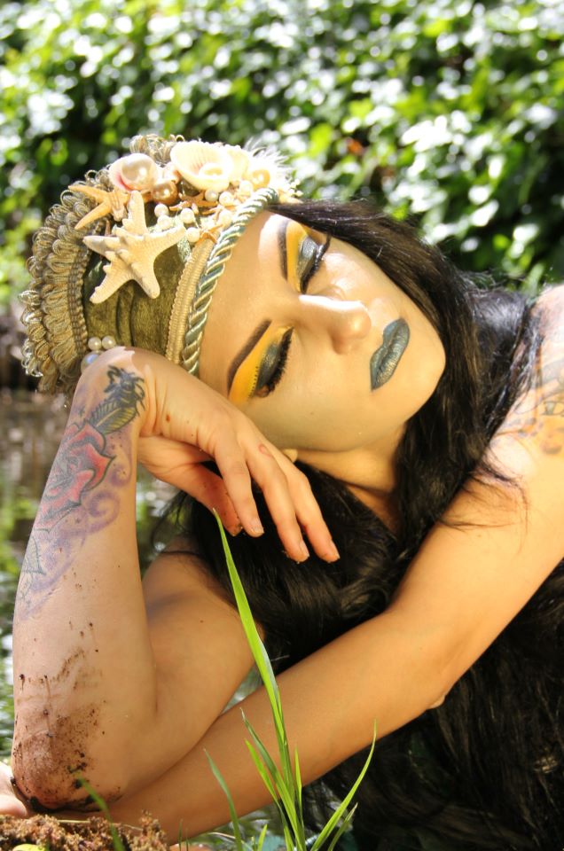 Female model photo shoot of Malicious Makeup