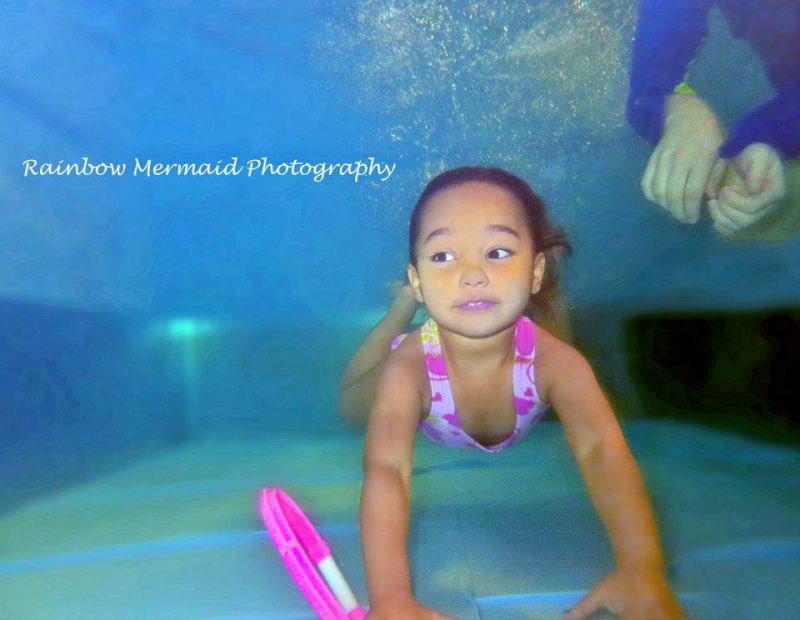 Female model photo shoot of Rainbow Mermaid Photog in FLOW Aquatics Swim School