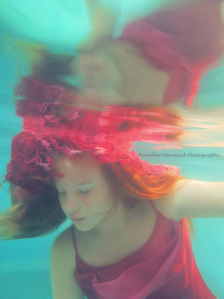 Female model photo shoot of Rainbow Mermaid Photog in FLOW Aquatics Swim School