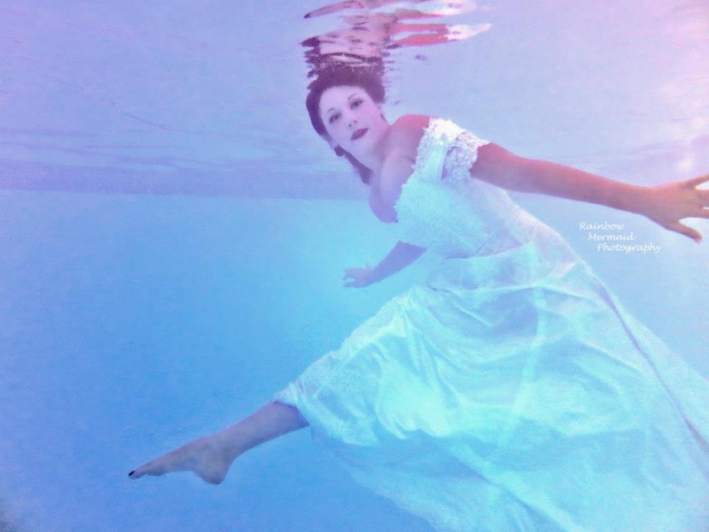 Female model photo shoot of Rainbow Mermaid Photog in TBMM Backyard Pool