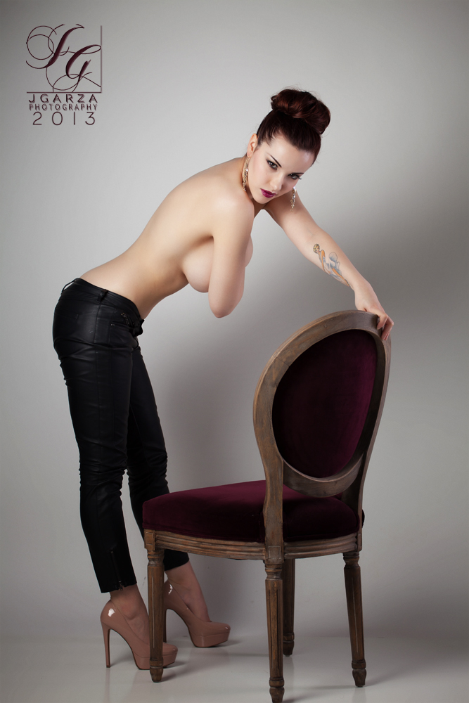 Male model photo shoot of JGarza Photography in The DarkRoom Studio
