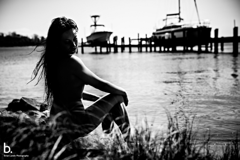 Female model photo shoot of A smile in the dark in Anna Arundel beach, Maryland