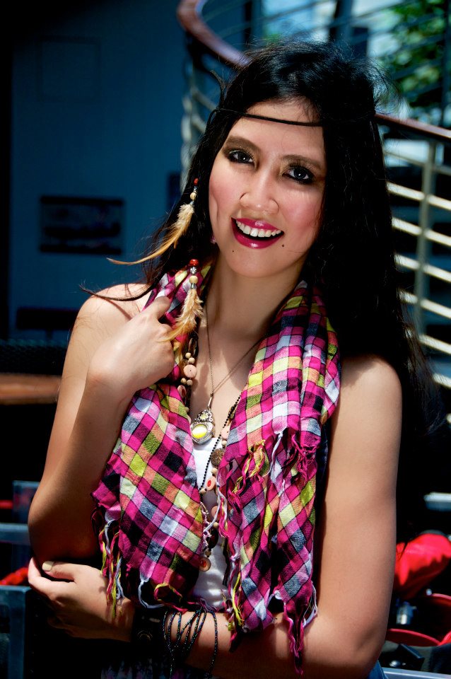 Female model photo shoot of strike a pose in Clarke Quay, Singapore
