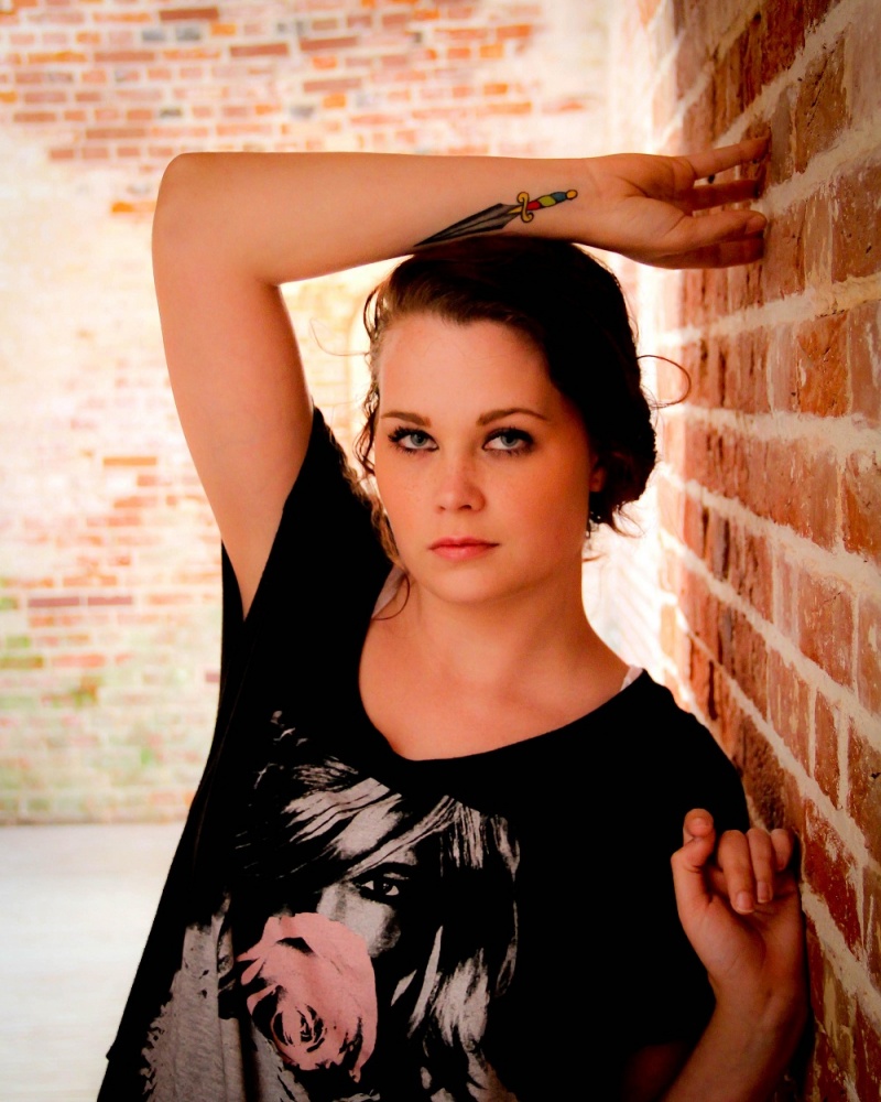 Female model photo shoot of Nikki for short in Fort Macon, NC