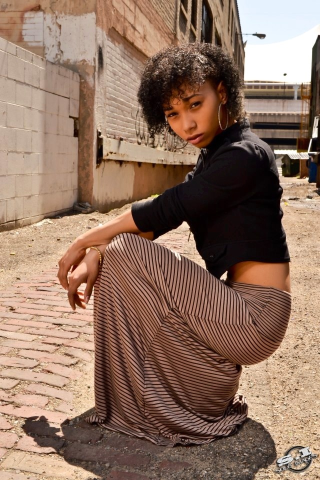 Female model photo shoot of Shatara Brown in Downtown Pontiac