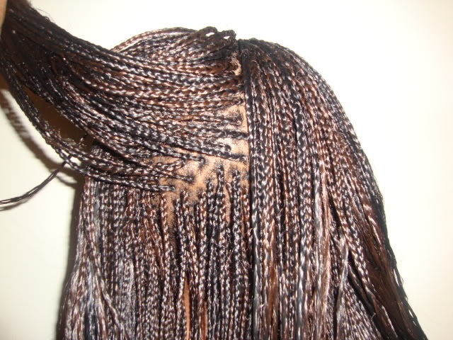Female model photo shoot of Ariet braids