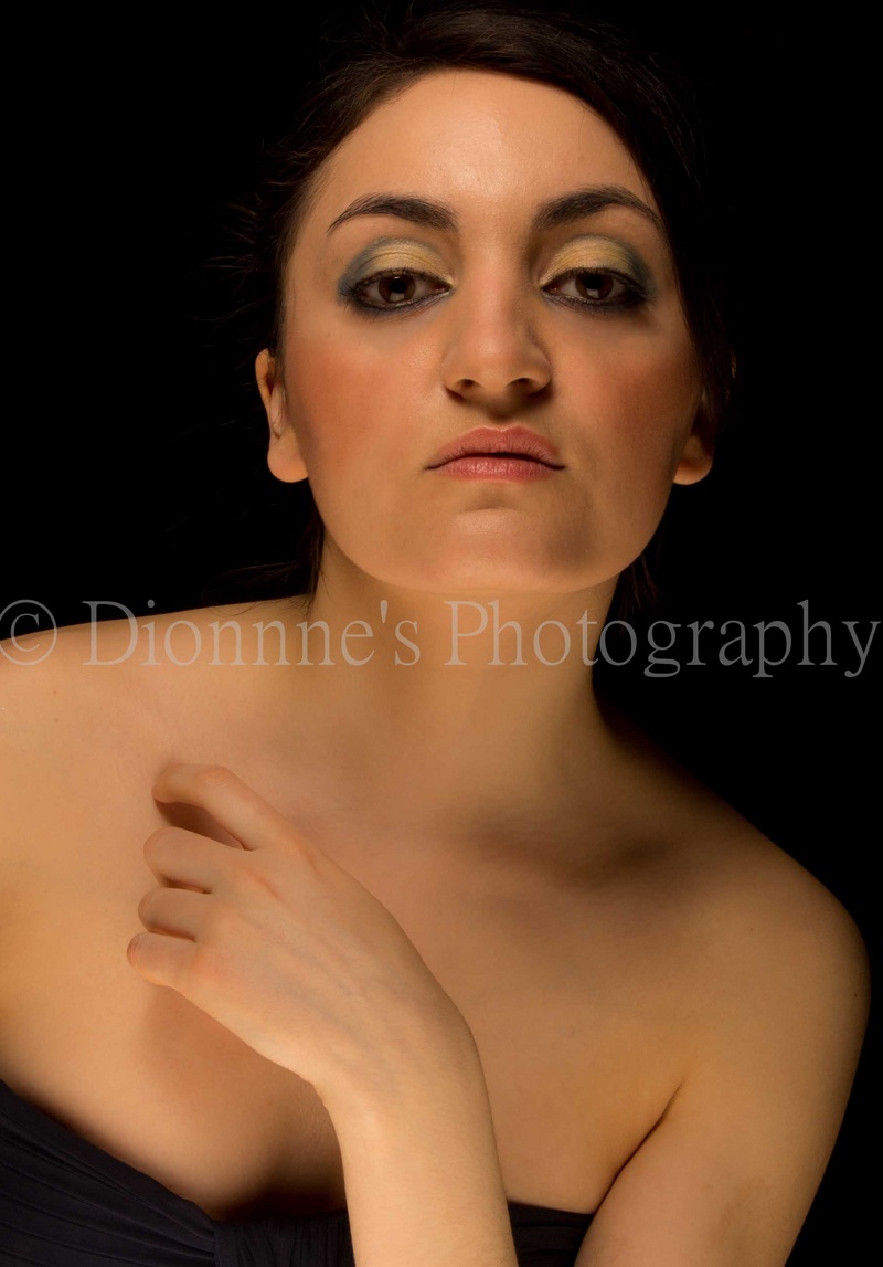 Female model photo shoot of Dionnes Photography