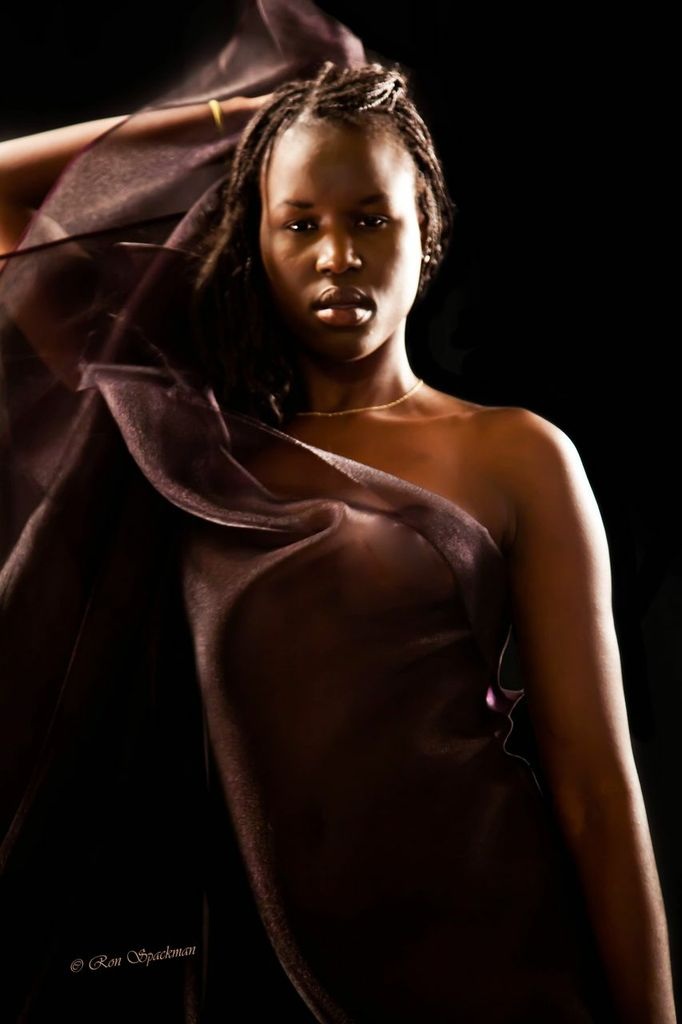 Female model photo shoot of AfrikanQueen by Ron Spackman in High River- the studio