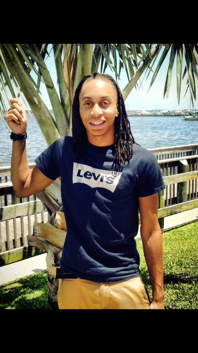 Male model photo shoot of Marcus Brinson  in Cocoa village river front