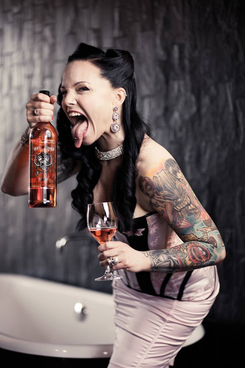 Female model photo shoot of Pepper Potemkin in Photo for world famous rocknroll band Motörhead and their very tasty rosé wine at Haringe Slott, Stockholm