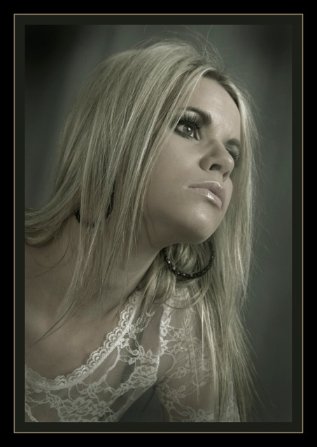 Female model photo shoot of Packin_A_Pistol, art by Addenda Studios