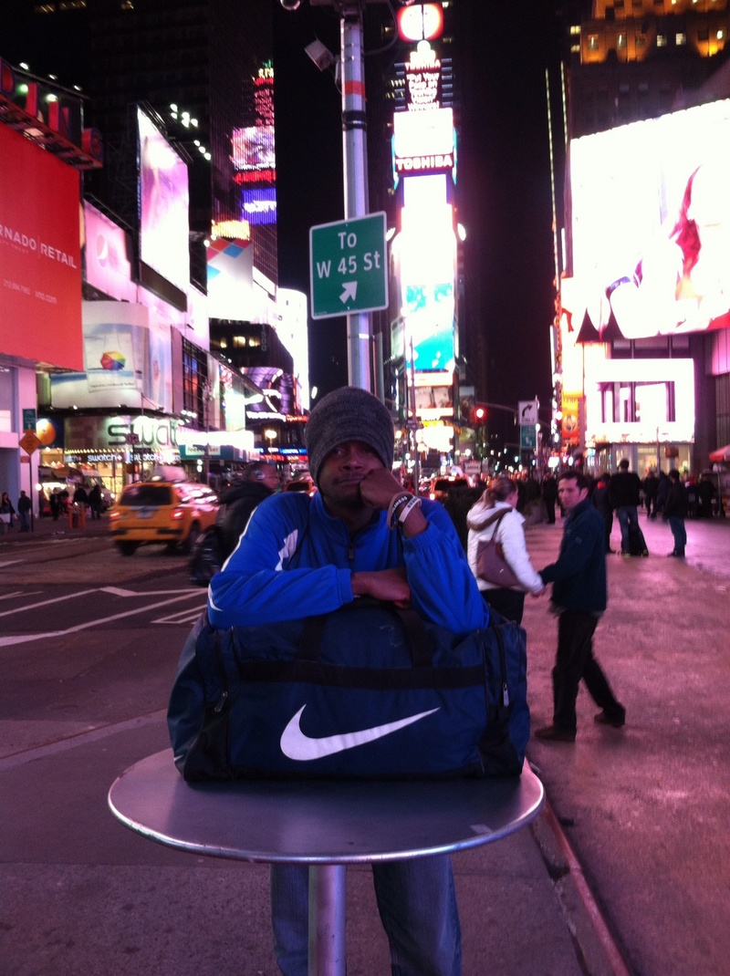 Male model photo shoot of Craiggis Williams  in Times Square, NYC
