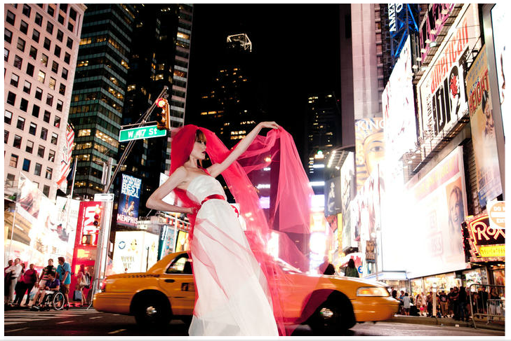 Female model photo shoot of Julia Tyrrell in Time Square