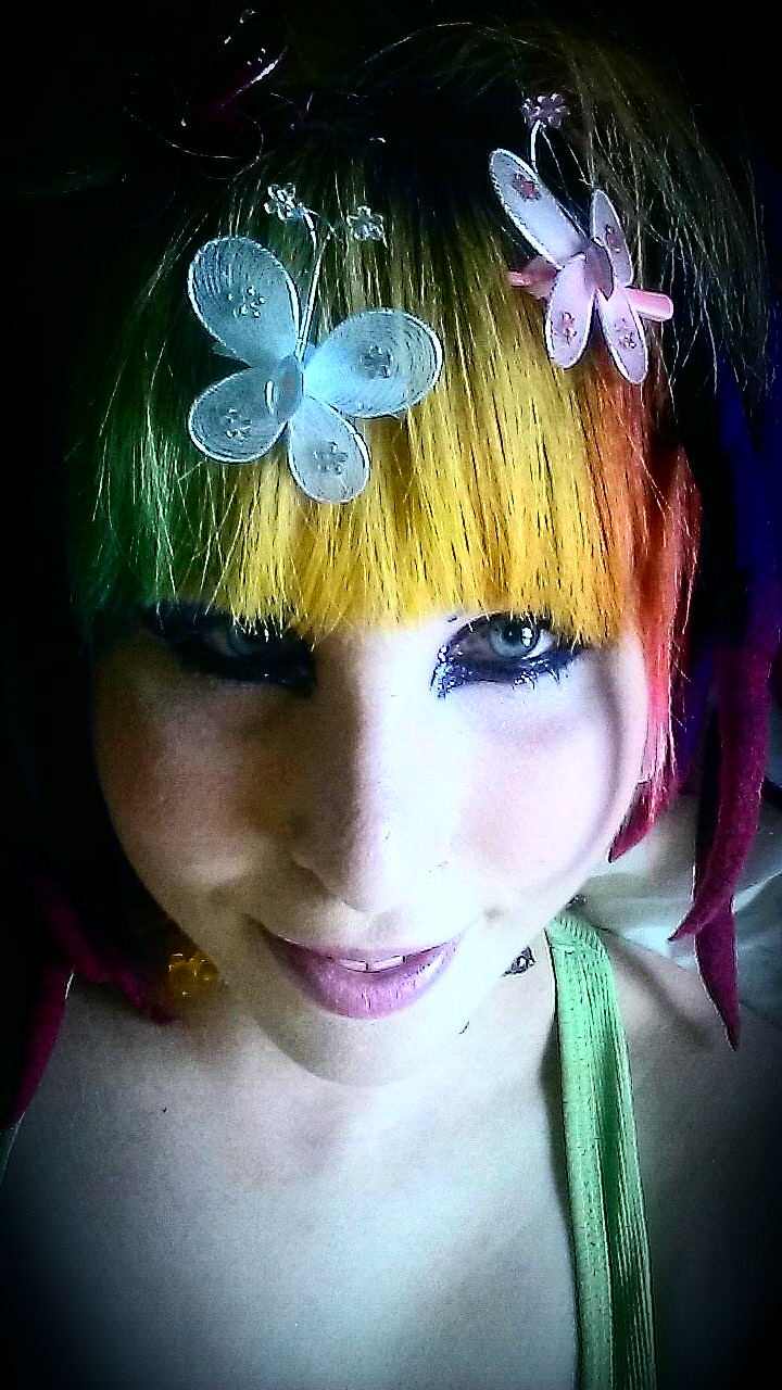 Female model photo shoot of Skittles Butterface, makeup by Jodi Monette x