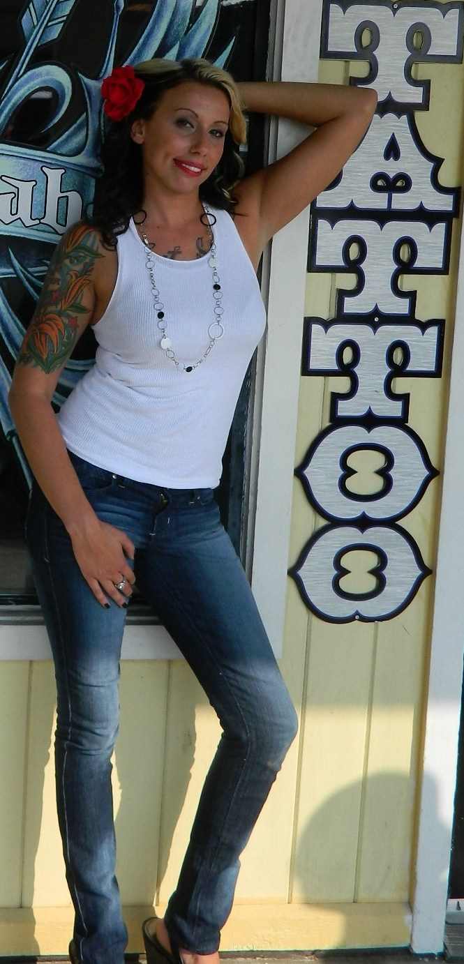 Female model photo shoot of April M Gonyea in SkinLab Tattoo Shop