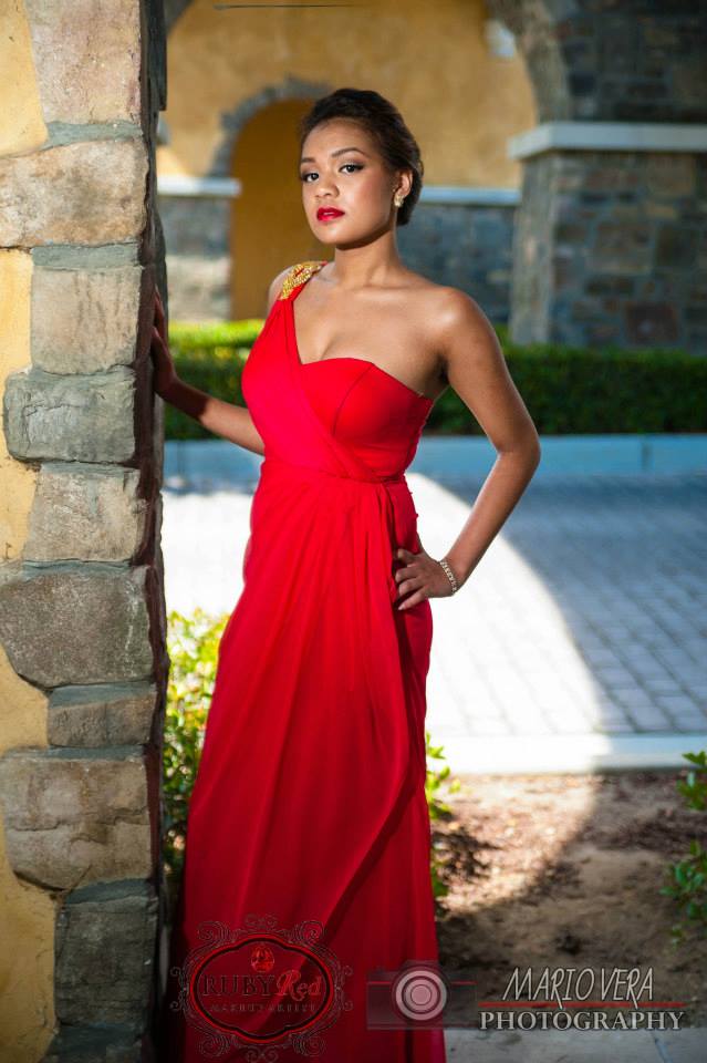 Female model photo shoot of Ruby Red MUA