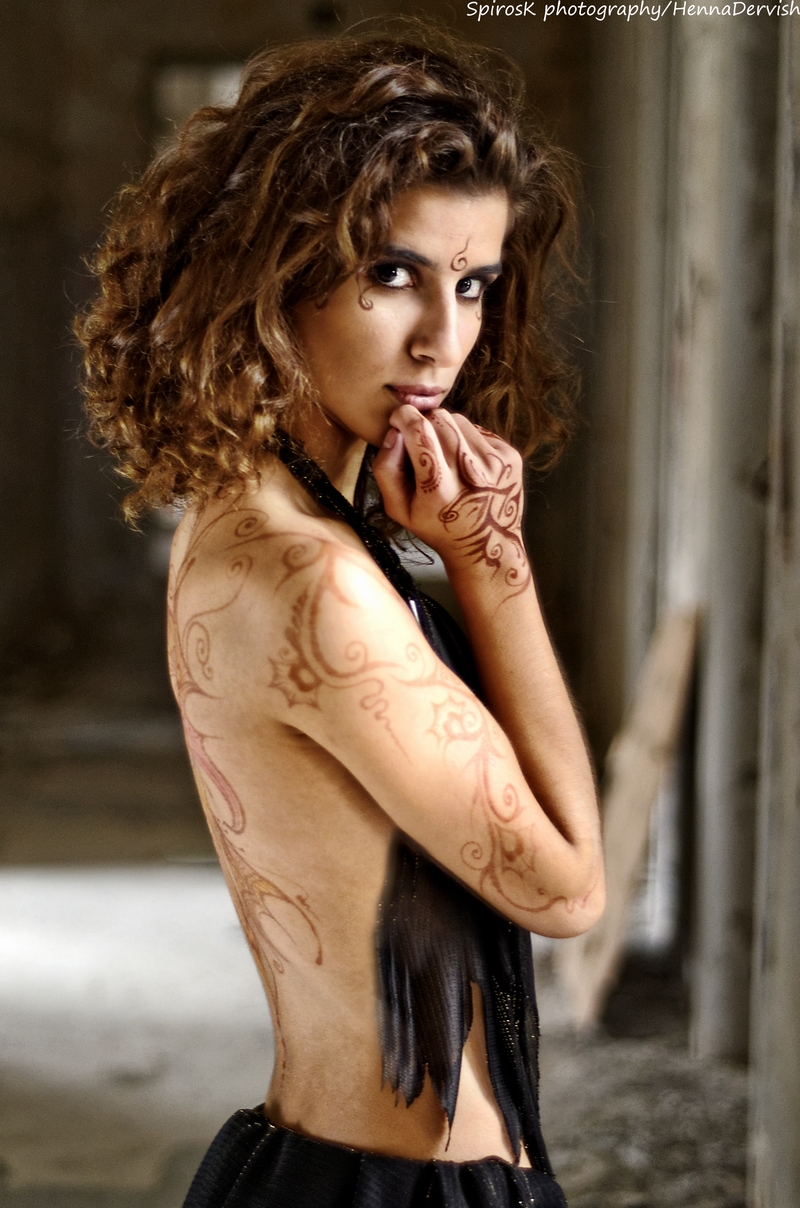 Female model photo shoot of Danai Gourd by SpirosK photography in Greece, body painted by HennaDervish