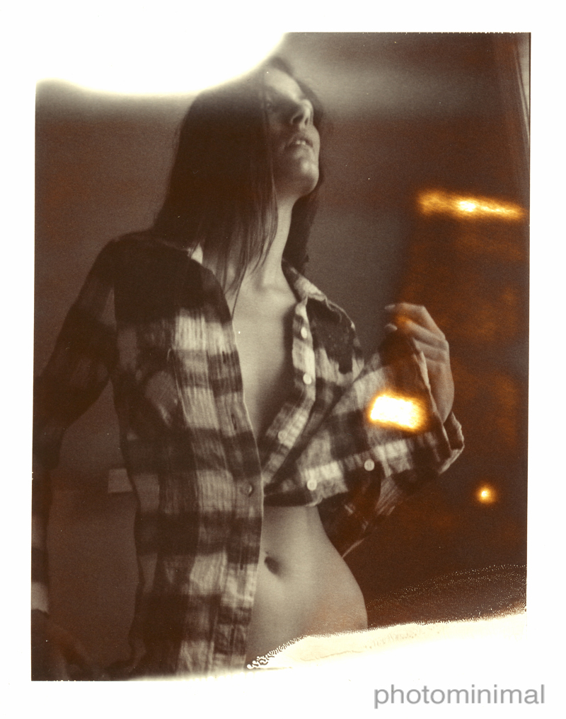 Male and Female model photo shoot of photominimal and Roarie-yum in Nashville / Polaroid Automatic 250 / Polaroid Sepia