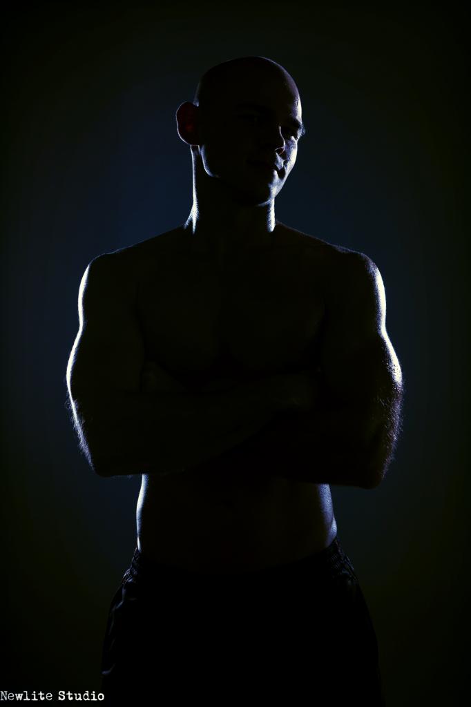 Male model photo shoot of Nathaniel Kain by Newlite Studio