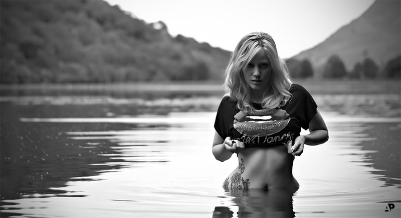 Female model photo shoot of tic toc in Lake District