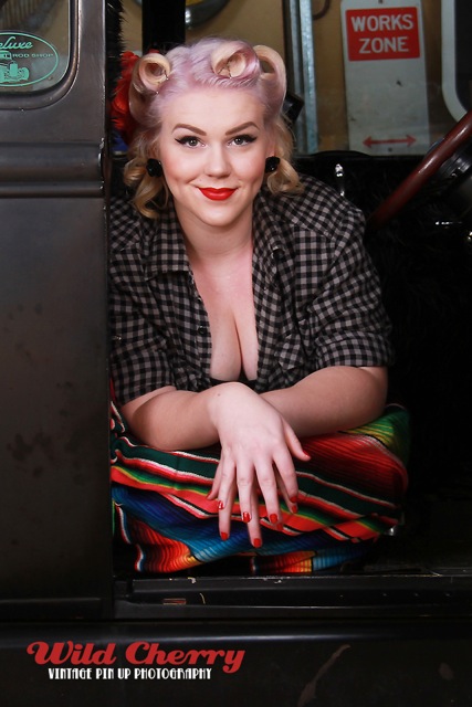 Female model photo shoot of Miss Cherie Amour in Wild Cherry Garage