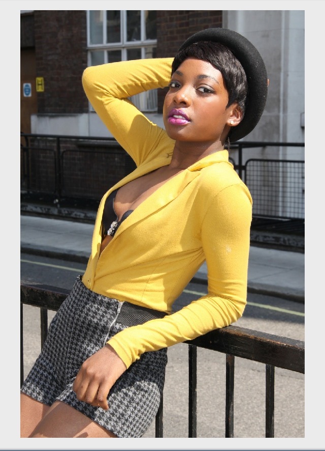 Female model photo shoot of Wande in Oxford circus