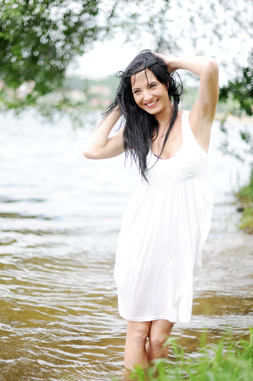 Female model photo shoot of Andzelikaa in Kauna's lake