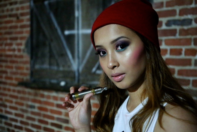 Female model photo shoot of Makeup By Melina