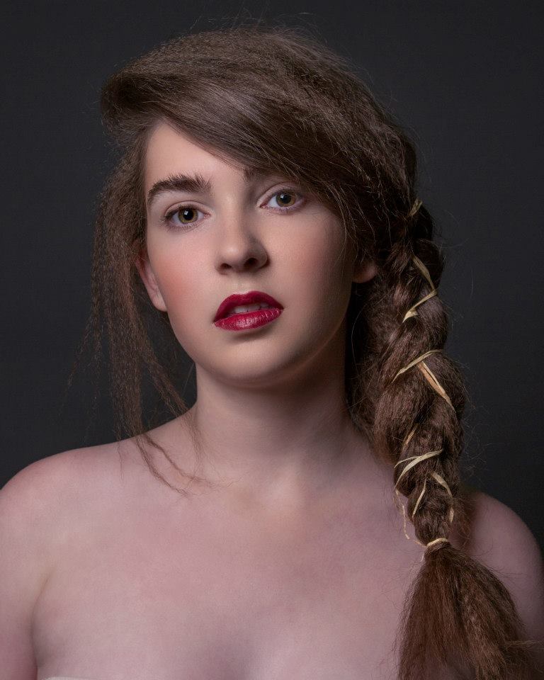 Female model photo shoot of Lochlan in Aveda Institute Denver
