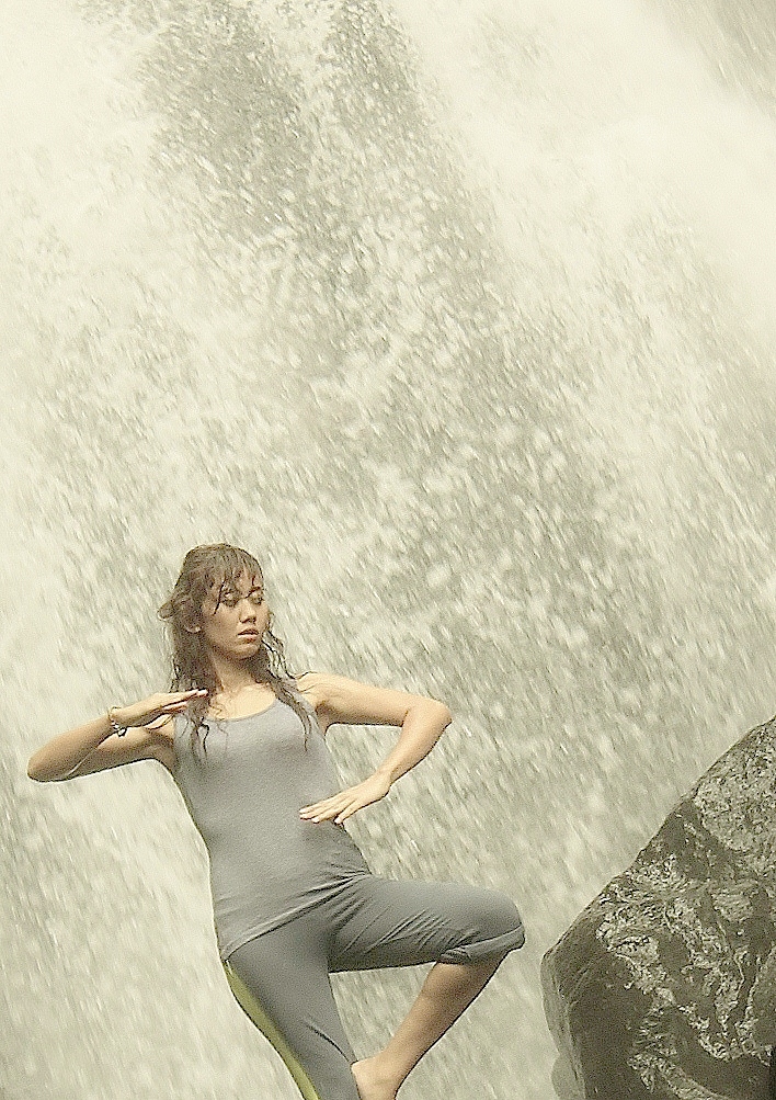 Female model photo shoot of Melan kwok in Indonesian waterfall