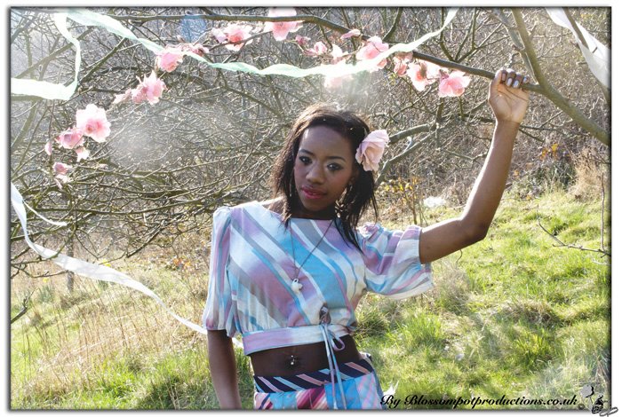 Female model photo shoot of Blossom Pot Productions and Kamara27x in Sheffield, makeup by coco MUA