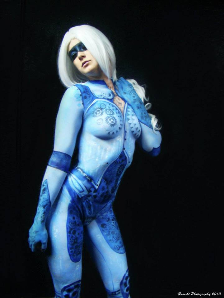 Female model photo shoot of SPARK body painting in Tallahassee florida