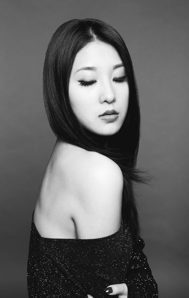 Female model photo shoot of Xiaofeng Li in soho, studio