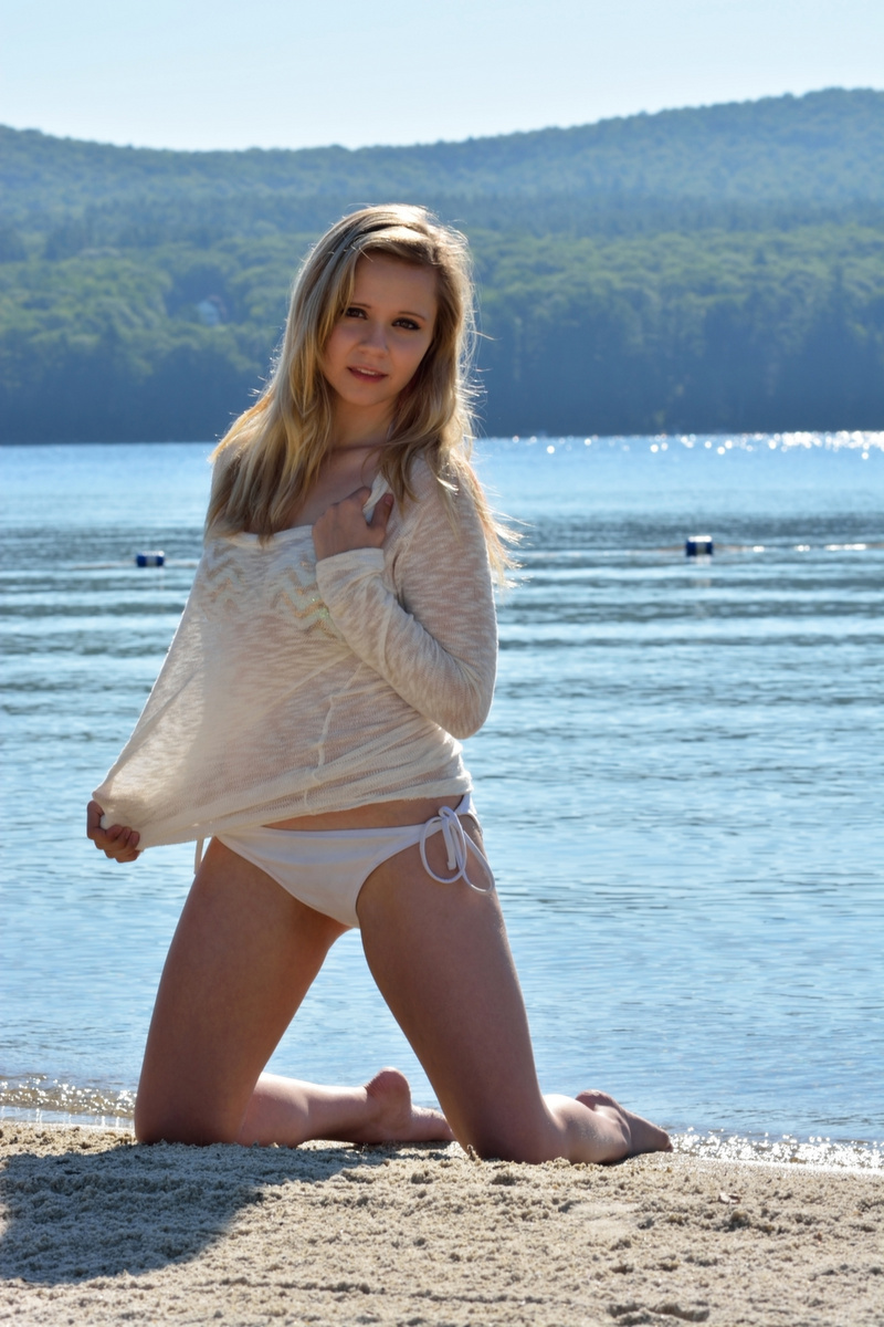 Female model photo shoot of Lyssie B by IncogniStudio in Lake Sunapee