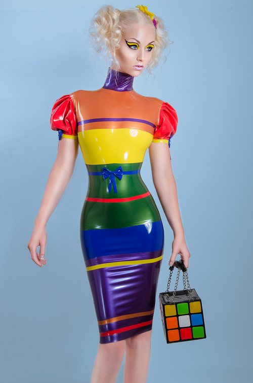 Female model photo shoot of Romanie smith by Roger Charles , clothing designed by Westward Bound Latex 