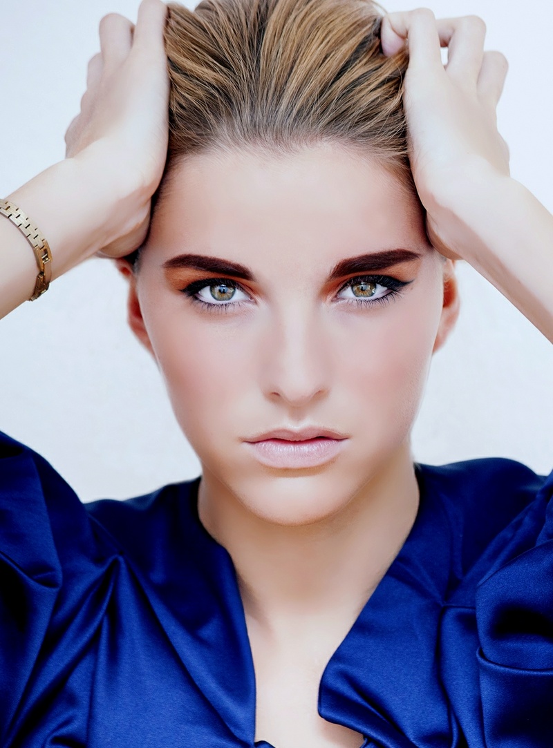 Female model photo shoot of yankee makeup