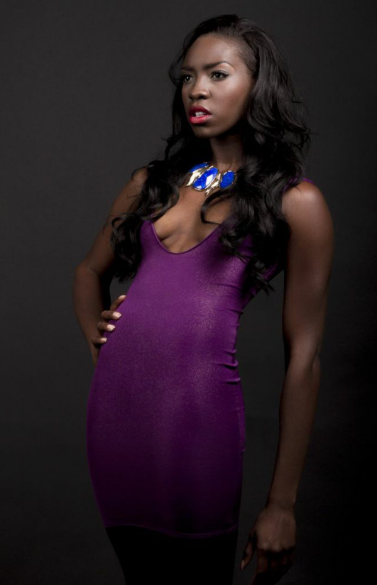 Female model photo shoot of Myra C by Brittani Shantel, clothing designed by Sultry Kouture