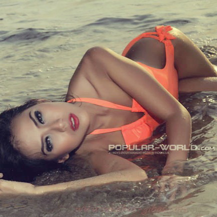 Female model photo shoot of Crystal Oceanie in Anyer beach. Indonesia