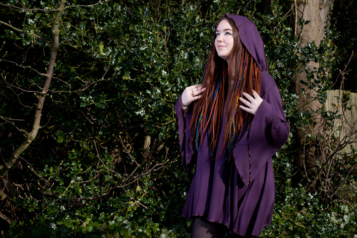 Female model photo shoot of Purple Elf Queen in Williamson Park, Lancaster, clothing designed by Twisted Pixie Clothing