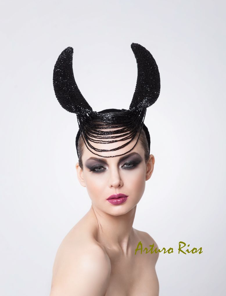 Male model photo shoot of ArturoRios Hat designer