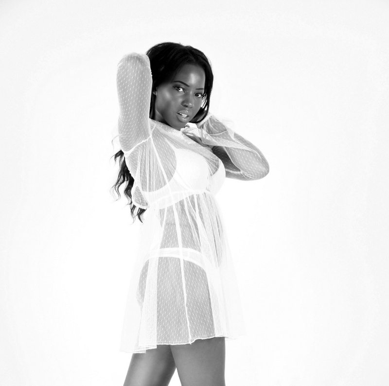 Female model photo shoot of Tinashe Bev