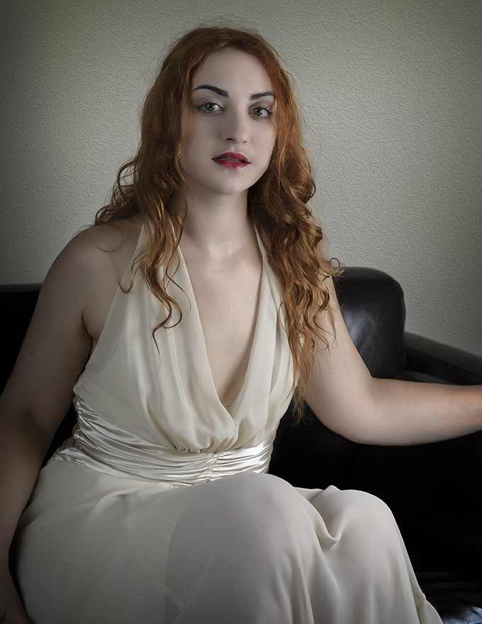 Female model photo shoot of theredhead by petergambaphotography