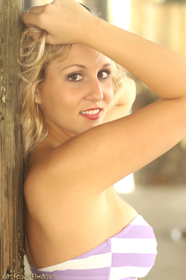 Female model photo shoot of Kaycee M Johnson in Cocoa Beach Pier