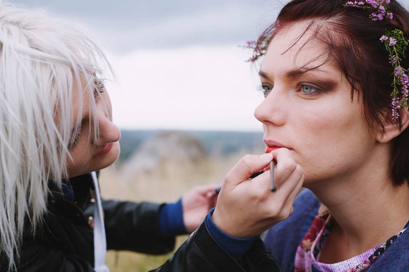 Female model photo shoot of Mad Hatter Make Up in Peak district