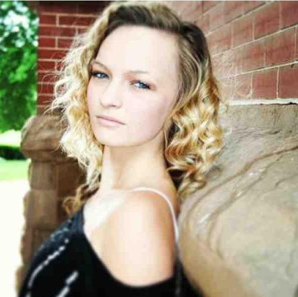 Female model photo shoot of Kinley Short