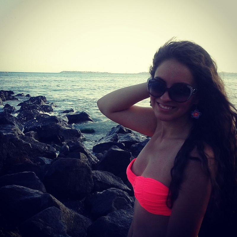 Female model photo shoot of Atina Topchieva in on the beach