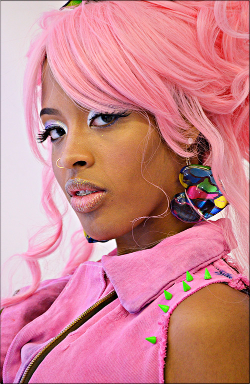 Female model photo shoot of Pink Lightning Clothing by Jlazlo Photos