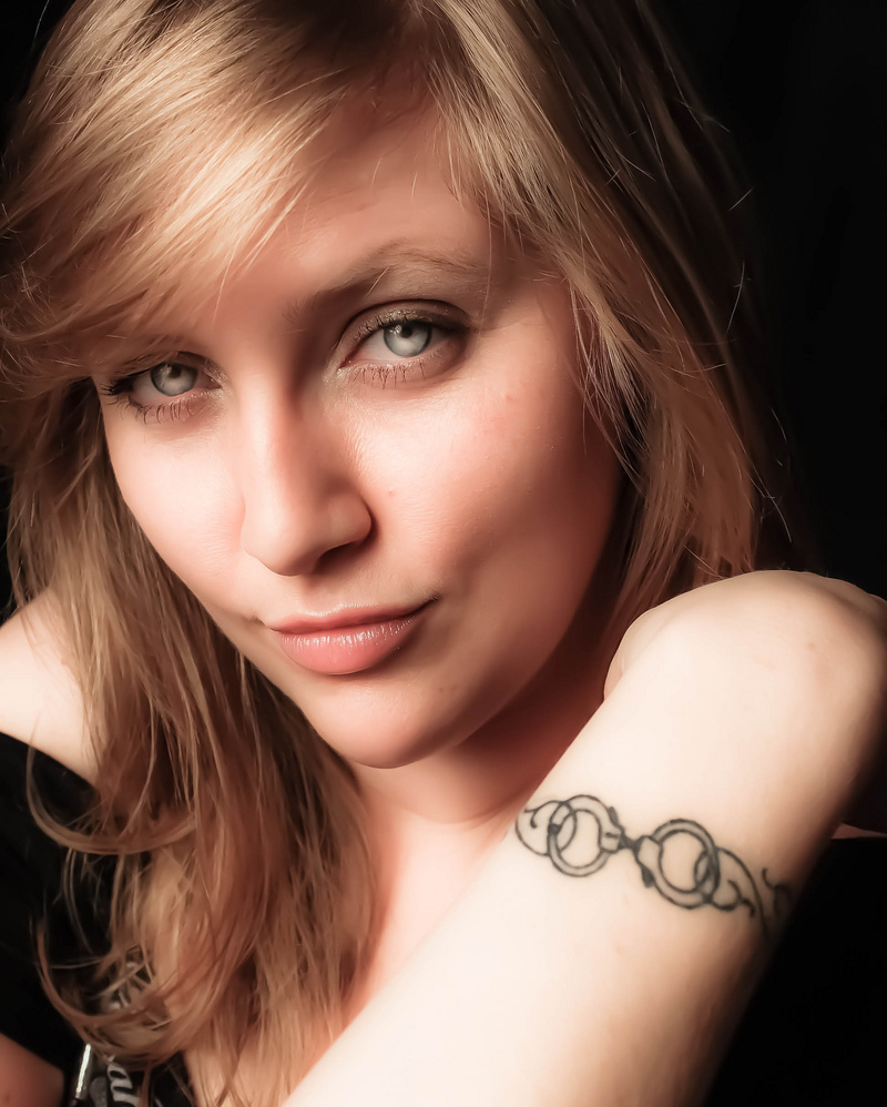 Female model photo shoot of TattedLizard Photograpy