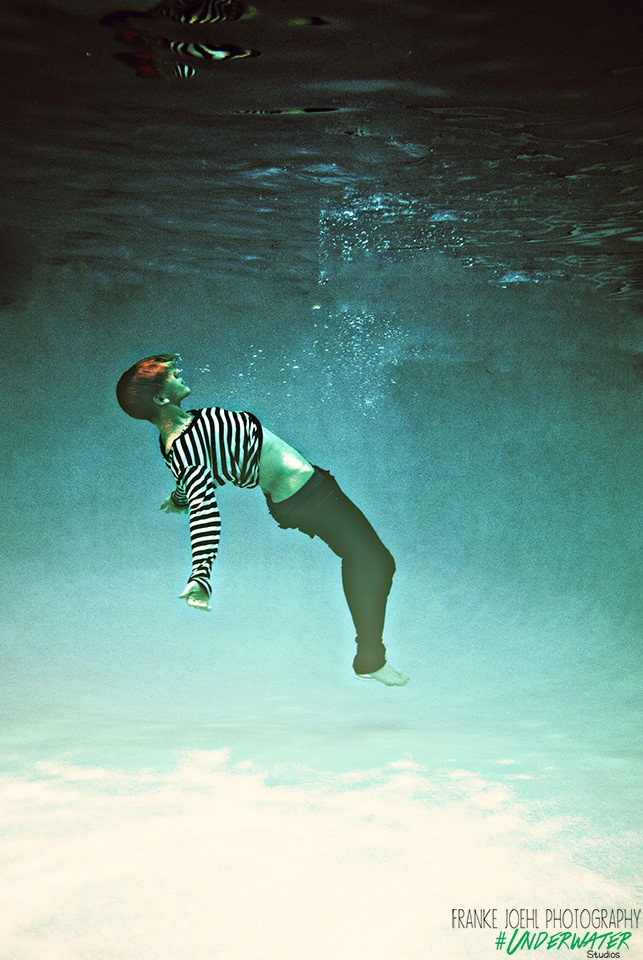 Male model photo shoot of K Weller in franke joehl underwater studios